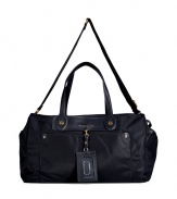 Stash away your weekend essentials in chic preppy style in Marc by Marc Jacobs navy nylon duffle bag - Tonal faux-leather trim, double top handles, removable adjustable nylon shoulder strap, front and back patch pockets with hidden magnetic snap closures, luggage tag clipped to front, embossed logo on front, top zip, inside strap with push-stud closures, 2 front wall slot pockets, zippered back wall pocket, gold-toned logo hardware - The perfect size for toting around travel essentials, or daily trips to the gym