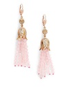 THE LOOKFeminine Metals collectionRhinestone ball and flower detailPink opal-colored tassel accent14k goldplated settingLatch back closureTHE MEASUREMENTLength, about 3ORIGINImported