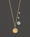 Diamond charms and golden discs sparkle and jingle on a 14K yellow gold chain.