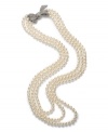 Channel your inner girly girl. A pretty bow accented by sparkling crystals highlights three rows of simulated pearls (8 mm) in this ultra-feminine Eliot Danori's necklace. Set in rhodium-plated mixed metal. Approximate length: 18 inches.