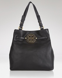 Highlight your daytime look with this large leather tote from Tory Burch. It's utterly effortless, simply slip your essentials inside for definitive daytime style. Highlight your daytime look with this large leather tote from Tory Burch. It's utterly effortless, simply slip your essentials inside for definitive daytime style.