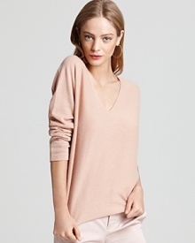 Luxurious and ultra-soft, this thin Vince cashmere sweater flaunts a front and back v neckline for the definition of chic. The perfect trans-seasonal layer, partner it with everything from love-worn jeans to a flowing maxi skirt.