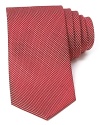 A micro basketweave pattern lends a classic look to this luxe silk tie from The Men's Store at Bloomingdale's.