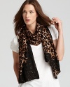 The lace and leopard trends combine in a high-impact scarf that will add animal appeal to your entire wardrobe: from Juicy Couture.