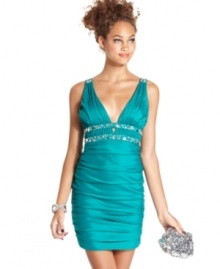 A plunging neckline and rhinestone embellishments make up a smoldering dress from City Triangles!