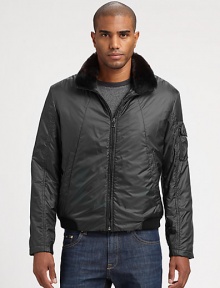 Streamlined seaming and a pocket detail at the sleeve adds dimension and design to this lightweight blouson jacket, ideal for layered ensembles as the temperatures tend to cool down. A luxe collar of super-soft rabbit fur offers an elegant finish.Zip-frontSide slash pocketsFlap pocket detail at sleeveFully linedAbout 25 from shoulder to hemPolyesterDry cleanImported