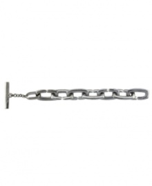 Sometimes, a simple layer is all you need to create a polished look. Vince Camuto's sophisticated Kiss bracelet provides just that touch with oval-shaped links and a chic toggle clasp in silver tone mixed metal. Approximate length: 8 inches. Sometimes, a simple layer is all you need to create a polished look. Vince Camuto's sophisticated Kiss bracelet provides just that touch with oval-shaped links and a chic toggle clasp in silver tone mixed metal. Approximate length: 8 inches.