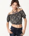 Show off your shoulders in this waist-revealing cropped top from Free People. The peasant styling adds a boho-chic touch!