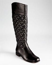Classic quilting comes to life on Corso Como's Santona boots, a surefire style with timeless appeal. A side zip and concealed gusset allow for easy on-and-off. Classic quilting comes to life on Corso Como's Santona boots, a surefire style with timeless appeal. A side zip and concealed gusset allow for easy on-and-off.