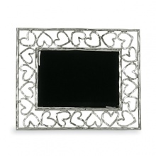 Michael Aram dancing heart photo frame in tarnish resistant silverplate. Ideal for someone you love. Michael Aram dancing heart photo frame in tarnish resistant silverplate. Ideal for someone you love.
