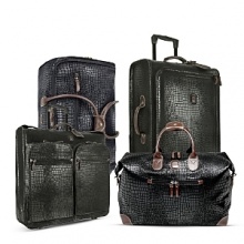 This classically styled crocodile-embossed luggage with leather trim provides the perfect pieces for any stylish traveler on the go. This classically styled crocodile-embossed luggage with leather trim provides the perfect pieces for any stylish traveler on the go.