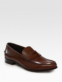 Fine Italian detail and craftsmanship in a timeless loafer design. Leather liningPadded insoleLeather soleMade in Italy