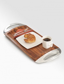 A distinctive look defined by the fine grains of natural acacia wood and the light-catching gleam of burnished metal alloy. An ideal serving piece for cocktails or hors d'oeuvres does double duty as a display for decorative items. Wood/metal 12W X 30L Imported A distinctive look defined by the fine grains of natural acacia wood and the light-catching gleam of burnished metal alloy. An ideal serving piece for cocktails or hors d'oeuvres does double duty as a display for decorative items. Wood/metal 12W X 30L Imported