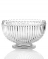 Past meets present. Feminine scalloped edges and fluted detail in sparkling glass make this Modern Vintage serving bowl a standout at the table and on display. From the Godinger serveware collection.