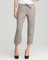 A clean silhouette and updated classic cargo details elevate these Eileen Fisher cropped linen pants. Pair with a billowy blouse and flats for effortlessly chic office attire.