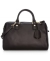 Add some polish to your daytime accessorizing with this classic silhouette from BCBGMAXAZARIA. Buttery-soft leather and subtle golden hardware lend a look of everyday elegance, while the organized interior keeps your essentials easily at hand.