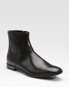 An elegant dress boot is designed in calfskin leather with side zips for easy on and off. Leather lining Padded insole Leather sole Made in Italy 