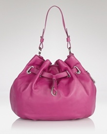 The drawstring bag is always a shapely accessory, yet Cole Haan's version has a sophisticated side. In leather with chic hardware, this beauty is a cinch with rich hues and heels. The drawstring bag is always a shapely accessory, yet Cole Haan's version has a sophisticated side. In leather with chic hardware, this beauty is a cinch with rich hues and heels.