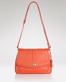 Brighten up your purse portfolio with Cole Haan's crossbody bag. In a crave-worthy hue and classic shape, this bag strikes an enviable balance between trendy and timeless. Brighten up your purse portfolio with Cole Haan's crossbody bag. In a crave-worthy hue and classic shape, this bag strikes an enviable balance between trendy and timeless.
