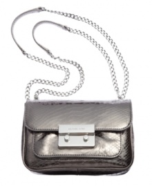 Get your shine on all night long with this glam little goodie from MICHAEL Michael Kors. Crafted from cool, croc-embossed leather with signature detailing, it's sized-right for your out-all-night essentials. Get your shine on all night long with this glam little goodie from MICHAEL Michael Kors. Crafted from cool, croc-embossed leather with signature detailing, it's sized-right for your out-all-night essentials.