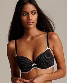 Seductive pinstripes lend classic style to this ruffle-trimmed push-up bra from Cosabella.