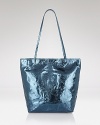 Carlos Falchi's tote is a luxe take on a classic shape. In metallic micro-fiber with an interior pouch, this style strikes an enviable balance between practicality and polish.