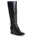 Ultra-modern, ultra-wearable Calvin Klein tall boots are designed for the ideal fit, with stretch microfiber back panels. Sculpted wedges and toggle ankle accents add points of difference.