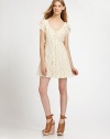 Gorgeous floral lace- this season's must-have trend- skims the body in a comely fit-and-flare frock.V necklineFlutter sleevesButton-down frontPrincess seamsSlip liningAbout 363 from shoulder to hem80% cotton/20% nylonHand washImportedModel shown is 5'10 (177cm) wearing US size Small.