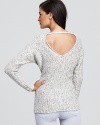 Add textural dimension to your winter-ready wardrobe with this chunky GUESS sweater, flaunting an unexpected deep V back.