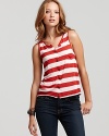 Show your stripes in this red and white Patterson J. Kincaid tank, a nautical look that introduces whimsy into any weekend day. Patch pockets and buttons through the front keep the look casual, so choose easygoing denim to pair with this sleeveless style.