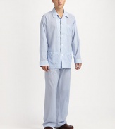 Lounge around all night and day in this luxuriously soft cotton two-piece set with piping for a classic feel. Machine wash. Imported.SHIRTButtonfrontSpread collarChest, waist patch pocketsPANTSFlat-front styleAdjustable two-button waistSide elastic waist insetsNo flyInseam, about 31