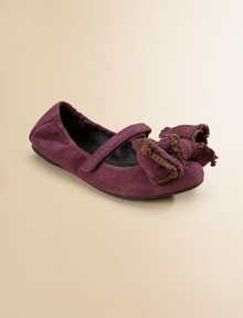 Classic ballet flats in buttery suede crested with an oversized fringed bow.Suede upper Adjustable grip-tape strap closure Rubber sole Imported Classic ballet flats in buttery suede crested with an oversized fringed bow.Suede upper Adjustable grip-tape strap closure Rubber sole Imported