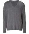 Elegant pullover in a fine medium grey heather wool and cashmere blend - With a deep V-neck - The cut is slim and straight with long sleeves - A casual classy basic for everyday wear - Very light, soft material - Small ribbed cuffs on the sleeves and hem - A classic favorite piece that works with all types of pants for leisure and business