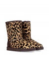 With a cool cheetah print and undeniably cozy interior, these haircalf boots from UGG Australia lend comfort and style to your cold weather look - Round toe, dark brown rubber sole, exposed seams, side button detail, contrasting back counter suede panel, cozy shearling lining - Hits above the ankle - Pair with favorite jeans, bright knits, and sporty outerwear