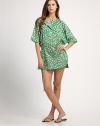 A relaxed-fit design with a customizable drawstring waist and lively print. Elasticized round neckElbow-length sleevesDrawstring waist70% cotton/30% nylonDry cleanImported