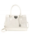 Cole Haan updates their iconic vintage-inspired tote with a pretty perforated floral pattern. Smooth leather and gunmetal hardware add just enough edge this prim and proper bag.