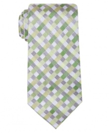Stay checked in to modern style with this handsome silk tie from Geoffrey Beene. Stay checked in to modern style with this handsome silk tie from Geoffrey Beene.