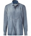 Ultra-stylish indigo destroyed denim shirt - This cotton-and-rayon-blend shirt can be worn casually or dressed up for night - Cool front pin-tuck details and hidden front buttons - Pair with slim trousers, a blazer, and boots for updated office attire - Try with black jeans, a leather jacket, and trainers