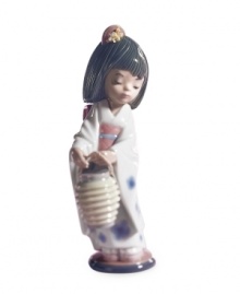 Wearing a traditional Japanese kimono and pretty hair comb, this little girl is ready for her biggest dance performance yet. Handcrafted in Lladro porcelain. Wearing a traditional Japanese kimono and pretty hair comb, this little girl is ready for her biggest dance performance yet. Handcrafted in Lladro porcelain.
