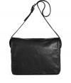 Stash away business essentials in style with Maison Martin Margielas jet black leather messenger bag, complete with practical pockets and characteristic cool detailing - Flap-over front, two-way zippered back pocket, top zip, inside zippered back wall pocket - Make it your everyday favorite accessory for a luxe note of streamlined modernity