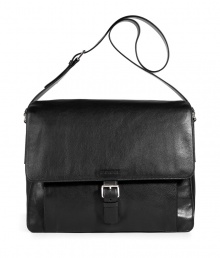 Elevate your workweek staples with this luxe leather messenger bag grom Jil Sander - Classic messenger style, front flap with buckle, adjustable shoulder strap, back zip pocket - Perfect for work or travel