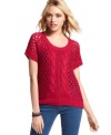 Keep warm, look cool in this knit sweater from Pink Rose! Features a perforated design that's anti-frumpy, pro-cute!