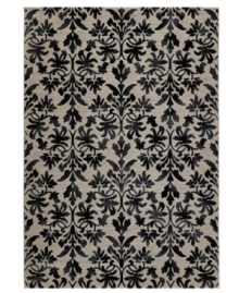 Reflections of Tibet. The Couristan Everest area rug features a beautiful floral pattern in shades of grey and black, crafted from thick-pile polypropylene that imparts a natural appearance and soft, luxurious finish. Reflections of Tibet. The Couristan Everest area rug features a beautiful floral pattern in shades of grey and black, crafted from thick-pile polypropylene that imparts a natural appearance and soft, luxurious finish.