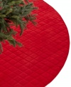 A quilted diamond motif and brilliant red hue make this Christmas tree skirt a timeless choice for every holiday season.