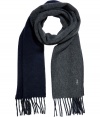 Wrap up in luxe style with this reversible two-tone scarf from Polo Ralph Lauren - Two-tone wool-blend scarf with fringed trim - Pair with a cashmere pullover, straight leg jeans, a parka, and suede ankle boots