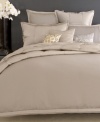 Lending absolute luxury to the bedroom, this Platinum Ash sham from Donna Karan features lush texture in a soothing hue for a look of modern sophistication. Finished with silk trim. Button closure.