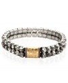 Look like a rock star with this stretch bracelet from RACHEL Rachel Roy. Crafted from gold-tone and silver-tone mixed metal, the bracelet is adorned with glass stones for a stylish touch. Approximate diameter: 2-1/4 inches. Approximate diameter, centerpiece: 1/2 inch.