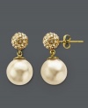 Warm up your look with the golden touch. Kaleidoscope's elegant earrings feature a gold crystal pearl and sparkling crystals with Swarovski Elements. Crafted in 18k gold over sterling silver. Approximate drop: 6/10 inch.