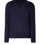 Elegant pullover in a fine dark blue wool and cashmere blend - With a deep V-neck - The cut is slim and straight with long sleeves - A casual classy basic for everyday wear - Very light, soft material - Small ribbed cuffs on the sleeves and hem - A classic favorite piece that works with all types of pants for leisure and business