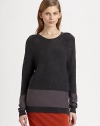 Lengthy, featherweight sweater of merino wool has pleated shoulders and glistening silk panels. RoundneckPleated shouldersLong sleeves with silk panelsSilk panel at hipsLonger length hits below the hipsBody: Merino wool; Contrast: SilkDry cleanImportedModel shown is 5'10 (177cm) wearing US size Small.